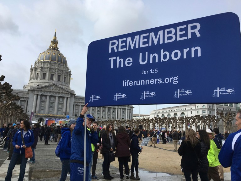 If Trump raised the anti-abortion banner above the White House shortly after taking office, he just ran it even higher up the proverbial flagpole. (AP Photo/Jocelyn Gecker)