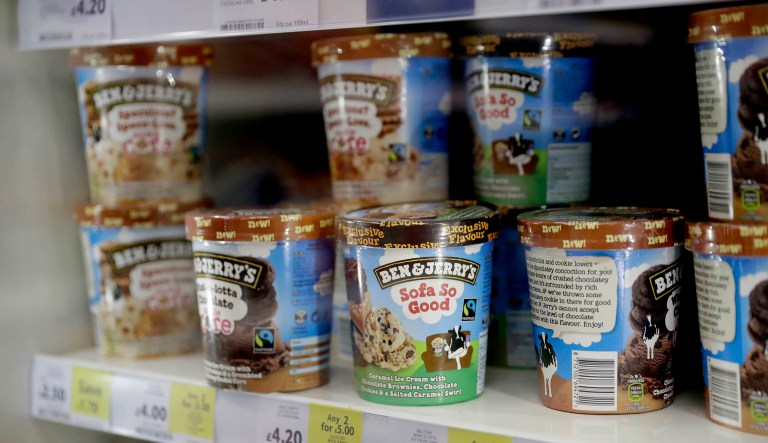 Containers of "Ben & Jerryâs, an ice-cream brand owned by the Anglo-Dutch multinational Unilever, stand on sale in a branch of Tesco in central London, Thursday, Oct. 13, 2016.