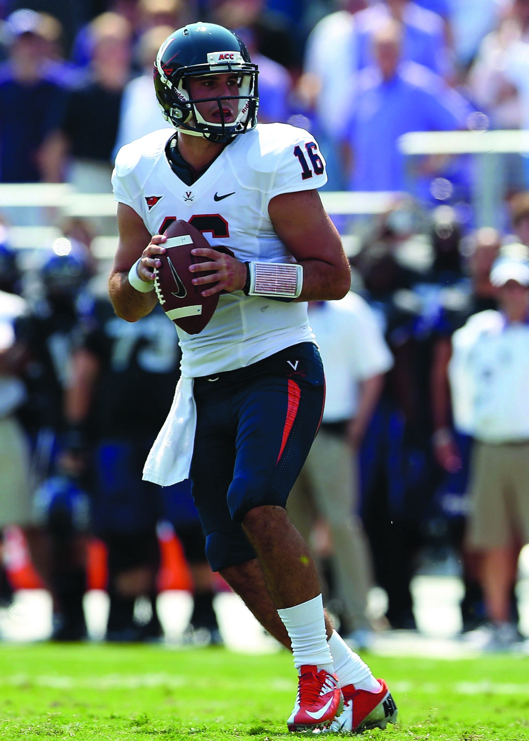 Virginia quarterbacks learning how to share