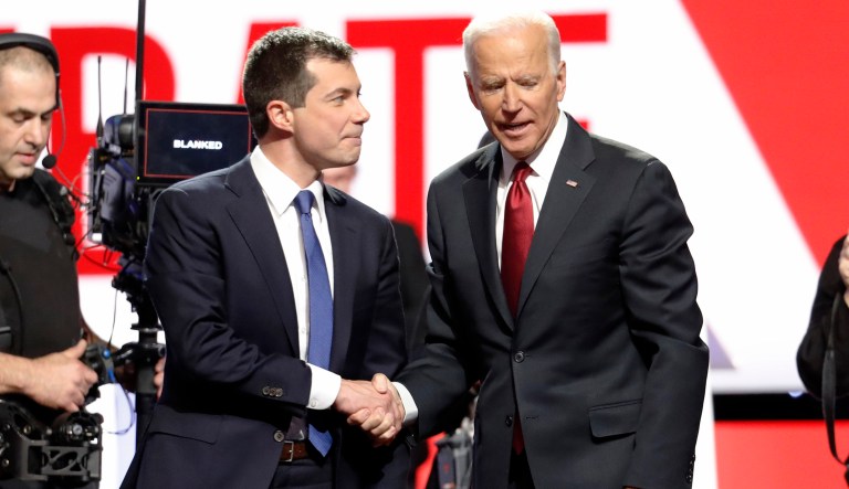Democratic presidential candidate South Bend Mayor Pete Buttigieg, left, and former Vice President Joe Biden talk on stage following a Democratic presidential primary debate hosted by CNN/New York Times at Otterbein University, Tuesday, Oct. 15, 2019, in Westerville, Ohio.