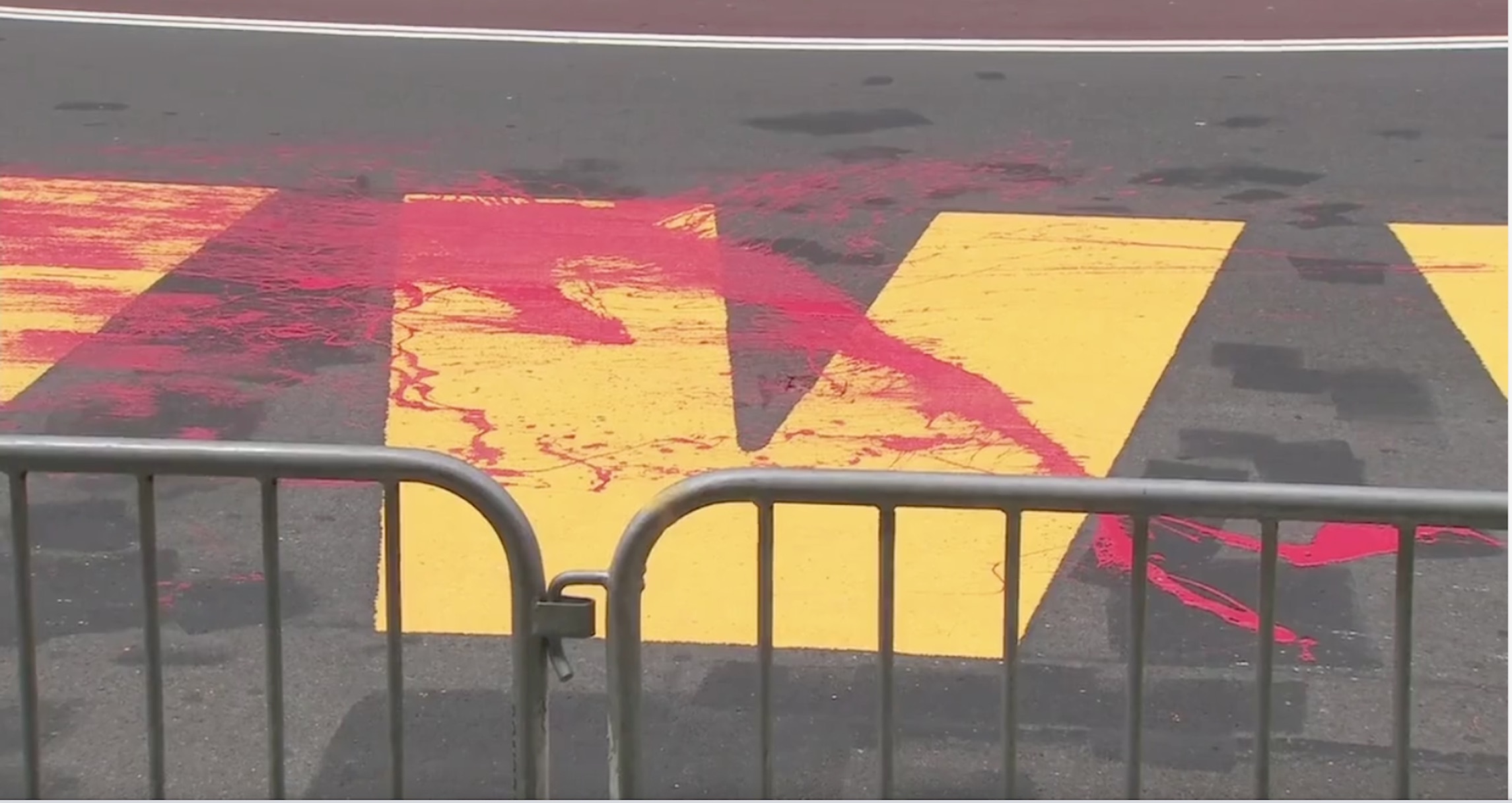 Black Lives Matter street art in front of Trump Tower vandalized with red paint
