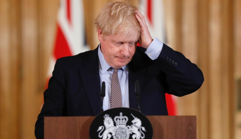 Britainâs prime Minister Boris Johnson speaks as he holds a press conference at Downing Street on the governmentâs coronavirus action plan in London, Tuesday, March 3, 2020.