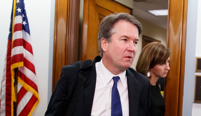 Brett Kavanaugh, President Donald Trump's Supreme Court nominee, and his wife Ashley Estes Kavanaugh, hold hands as they leave a holding room after a Senate Judiciary Committee hearing on Capitol Hill in Washington, Thursday, Sept. 27, 2018.