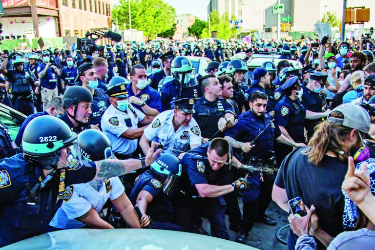 Protesters and police clash during a protest on May 30 in the Brooklyn borough of New York City. 
