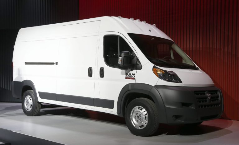 FILE - In this Feb. 7, 2013 file photo, the 2014 Ram ProMaster 3500 Cargo Van is presented at the Chicago Auto Show, in Chicago. Chrysler is recalling more than 31,000 of the commercial vans to fix a problem with the headrests. (AP Photo/Charles Rex Arbogast, File)