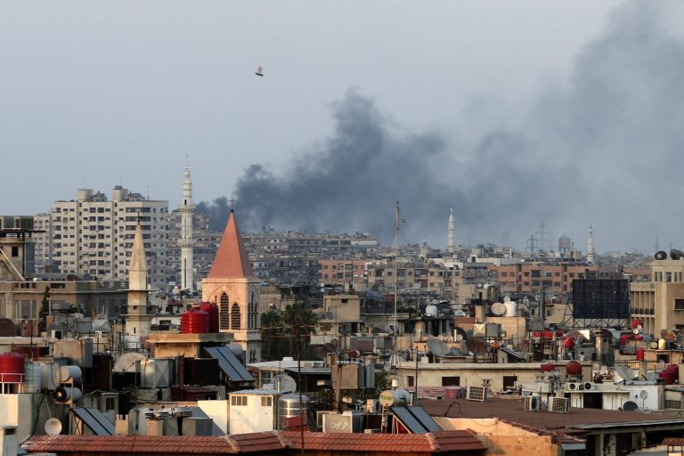 Columns of smoke rising from heavy shelling in the Jobar neighborhood in west Damascus, Syria. (AP/Hassan Ammar)