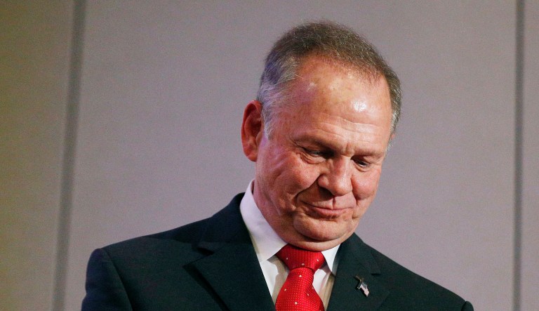 Pastor Flip Benham, a right-wing preacher, defended embattled Republican Alabama Senate candidate Roy Moore on Monday. Benham said that if Moore did pursue younger women when he was in his 30s, it wasn't necessarily unlawful or inappropriate. (AP Photo/Brynn Anderson)