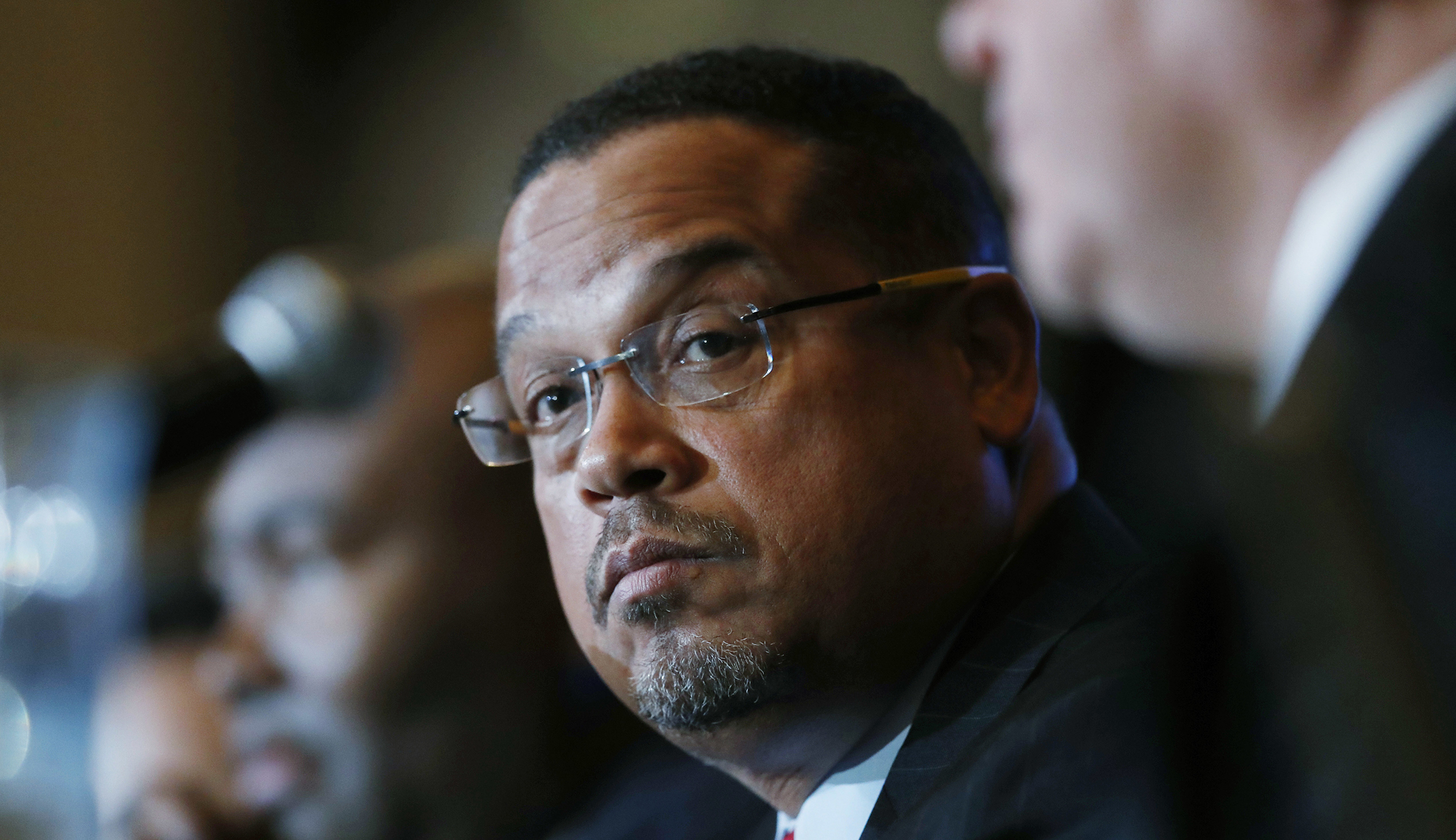 Keith Ellison sports ‘I don’t believe in borders’ T-shirt