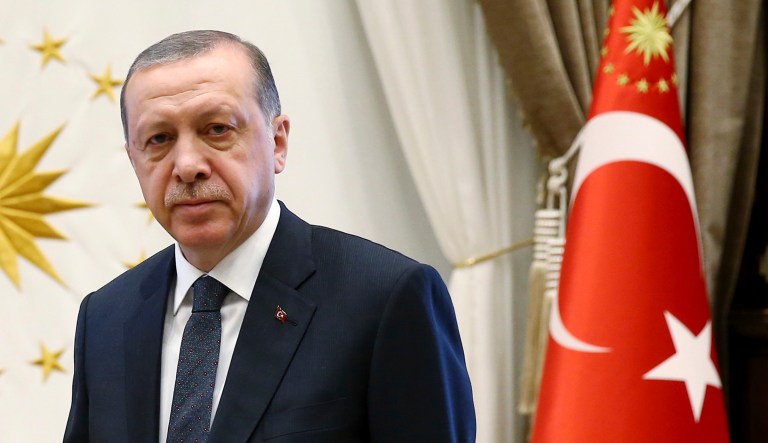 Turkey's President Recep Tayyip Erdogan will be banned by the Trump administration from purchasing weapons from a U.S. manufacturer. The cancellation drew immediate applause from Congress, where Republican and Democratic lawmakers have demanded that Trump punish Erdogan. (Presidency Press Service via AP, Pool)