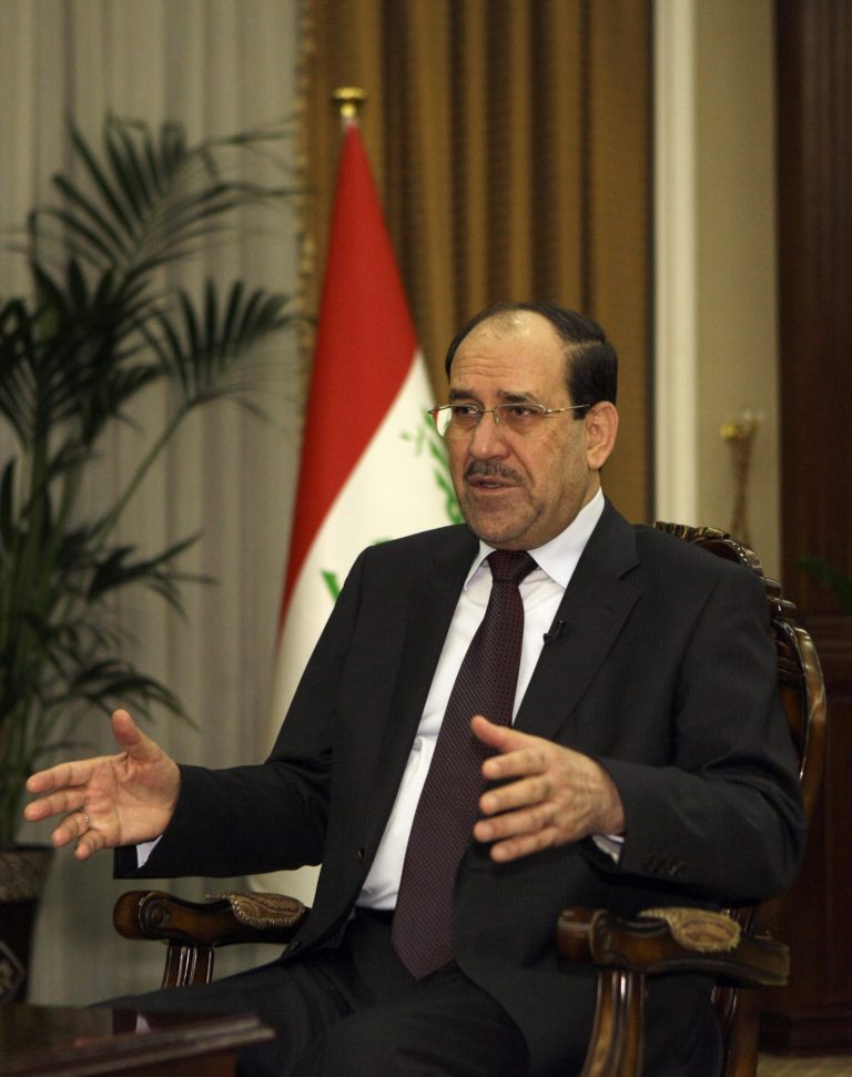 Iraq's Prime Minister Nouri al-Maliki speaks during an interview with The Associated Press in Baghdad, Iraq, Wednesday, Feb. 27, 2013. Al-Maliki warns that a victory for rebels fighting to overthrow the Syrian President Bashar Assad would spark a sectarian war in his own country and Lebanon, and create a new haven for extremists that would destabilize the wider Middle East. (AP Photo/ Khalid Mohammed)