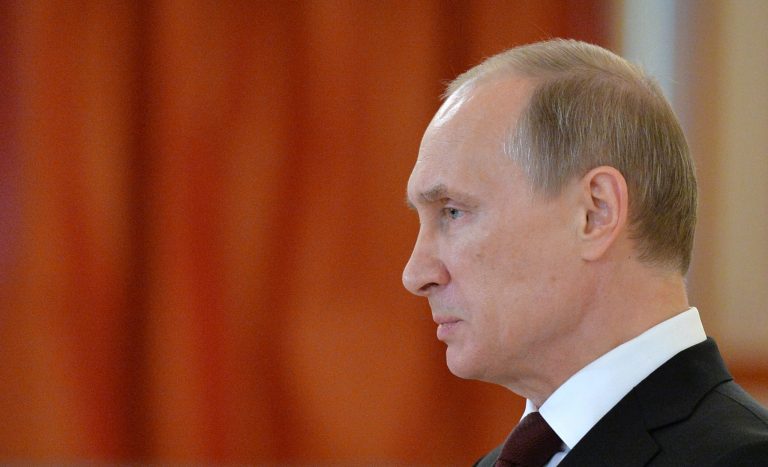 Russian President Vladimir Putin attends  a ceremony of the presentation of credentials, in the Grand Kremlin Palace in Moscow, Friday, June 27, 2014. (AP Photo/Yuri Kadobnov, Pool)