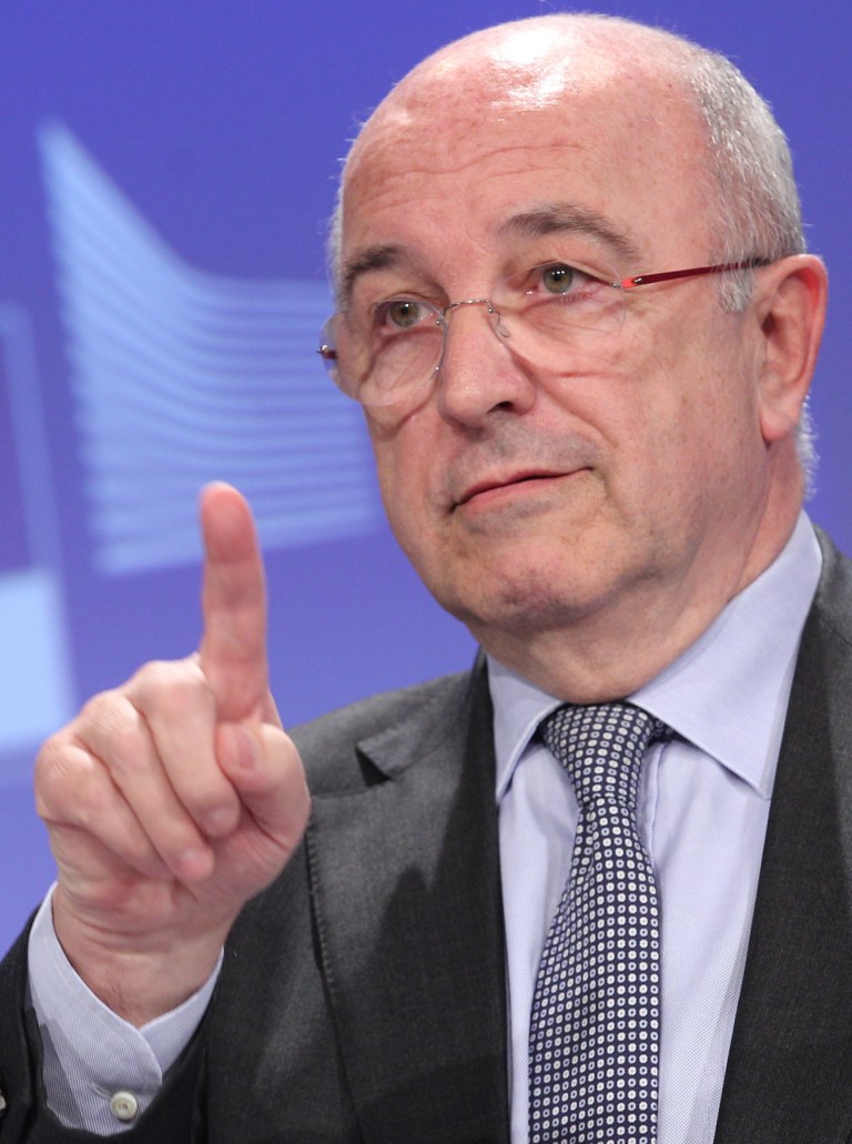   European Commissioner for Competition Joaquin Almunia addresses the media, at the European Commission headquarters in Brussels, Wednesday, Dec. 5, 2012. The European Union has imposed a massive fine of almost euro1.5 billion ($2 billion) on seven international companies for fixing the market of television and computer monitor tubes for a decade ending in 2006. (AP Photo/Yves Logghe)  