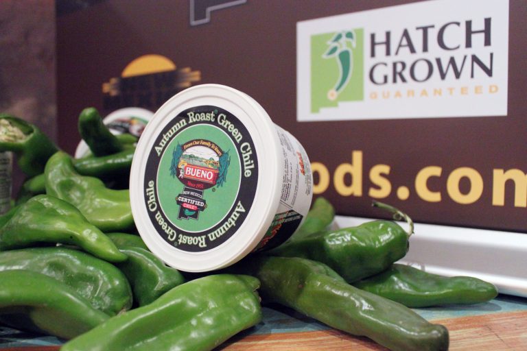 Fresh green chile and chile products are displayed as state officials announce a new certification program aimed at protecting the reputation and integrity of New Mexico-grown chile during an event at The Range restaurant in Bernalillo, N.M., on Tuesday, Aug. 19, 2014. The restaurant is the first to sign up to participate in the program. (AP Photo/Susan Montoya Bryan)