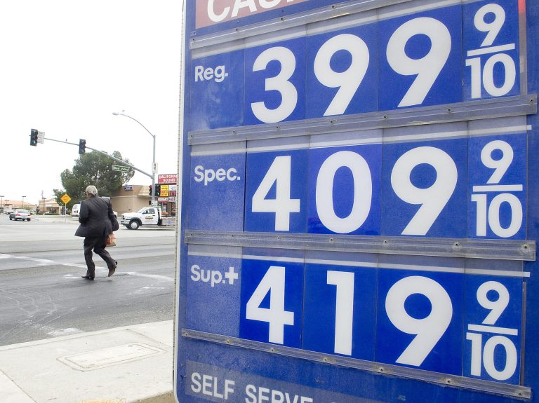 Gasoline prices are expected to hit their lowest summer average since 2009, the U.S. Energy Information Administration said Tuesday. (AP Photo)