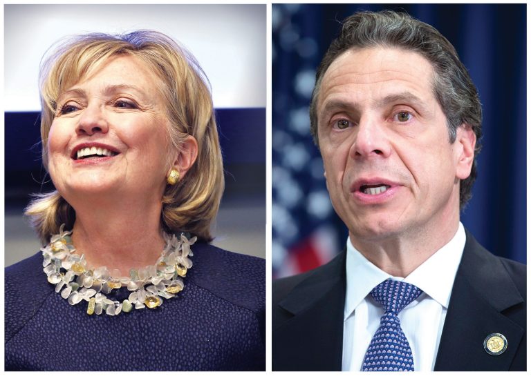 New York Gov. Andrew Cuomo, right, and Hillary Cliinton. (AP Photo)