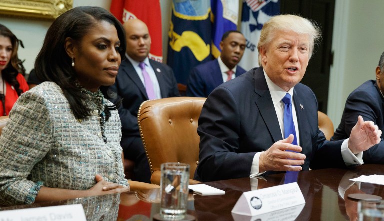 A friend of Omarosa Manigault Newman has suggested the outgoing White House aide left as a result of President Trump's endorsement of embattled Senate candidate Roy Moore of Alabama. (AP Photo/Evan Vucci, File)