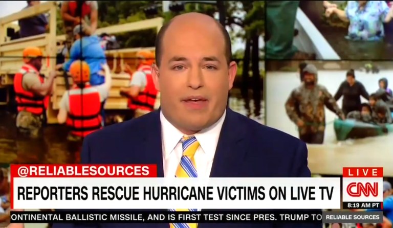 CNN's Brian Stelter slammed President Trump Sunday for criticizing the media while praising the U.S. Coast Guard for its Hurricane Harvey rescue operations. (Image courtesy screenshot)