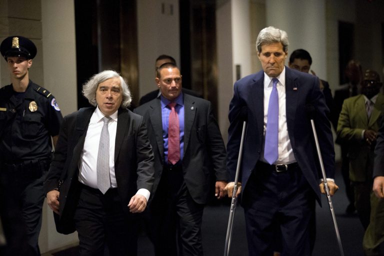 Secretary of State John Kerry, right, and Secretary of Energy Ernest Moniz, left, arrive for a classified briefing for all House members on Capitol Hill, in Washington, Wednesday, July 22, 2015, about the deal reached to curb Iran's nuclear program in exchange for billions of dollars in relief from international sanctions. (AP Photo/Andrew Harnik)