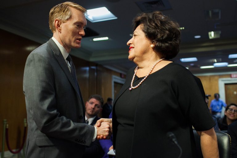 Office of Personnel Management (OPM) Director Katherine Archuleta greets Senator James Lankford, R-OK, at a Senate Appropriations Committee on Tuesday, June 23. 2015. Archuleta testifiee on the data security breach at the OPM. The personal data of an estimated 18 million current, former and prospective federal employees were affected. (Graeme Jennings/Washington Examiner)