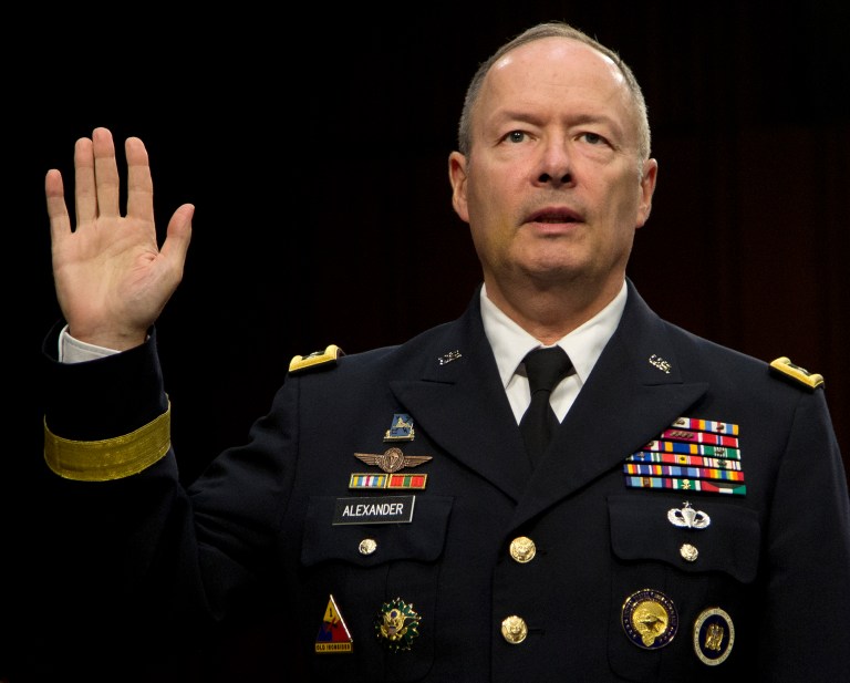   National Security Agency Director General Keith Alexander is sworn on Capitol Hill in Washington, Thursday, Sept. 26, 2013, prior to testifying before the Senate Intelligence Committee hearing on the Foreign Intelligence Surveillance Act (FISA), and National Security Agency (NSA) call records. Clapper told lawmakers he's willing to consider limits on surveillance by the National Security Agency. (AP Photo/Carolyn Kaster)  