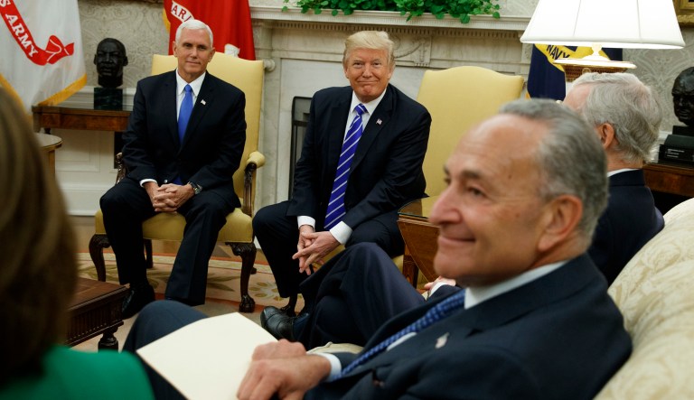 Democrats, who have no problem sticking together, are now putting a price on their cooperation. (AP Photo/Evan Vucci)