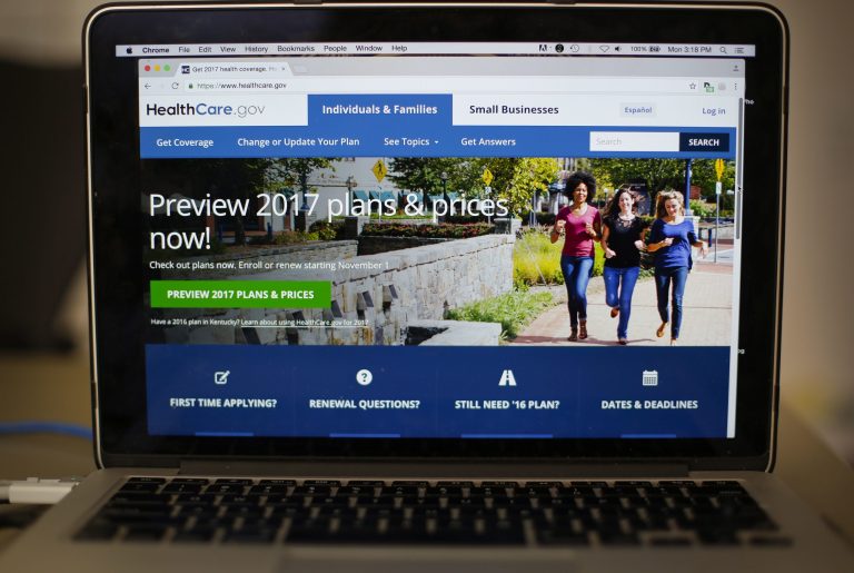FILE - In this Oct. 24, 2016 file photo, the HealthCare.gov 2017 web site home page is seen on a laptop in Washington. Add Medicaid expansion to the list of 