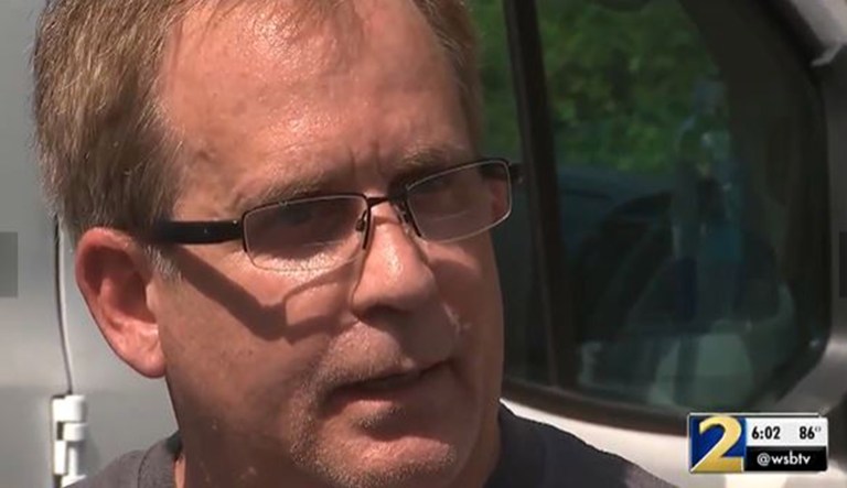 Eric Sparkes is seen.