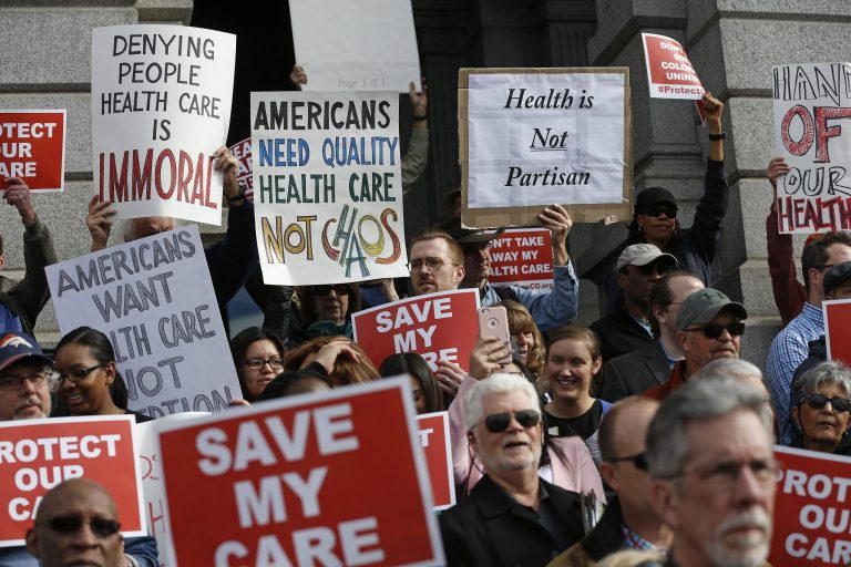 It isn't as cool or as famous as the Coke vs. Pepsi battle, but the battle lines have been drawn in the healthcare debate. (AP Photo/Brennan Linsley)