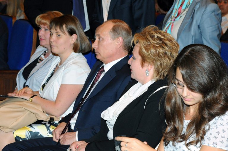 Russian President Vladimir Putin, third right, and his wife Lyudmila, second right, attend the ballet 