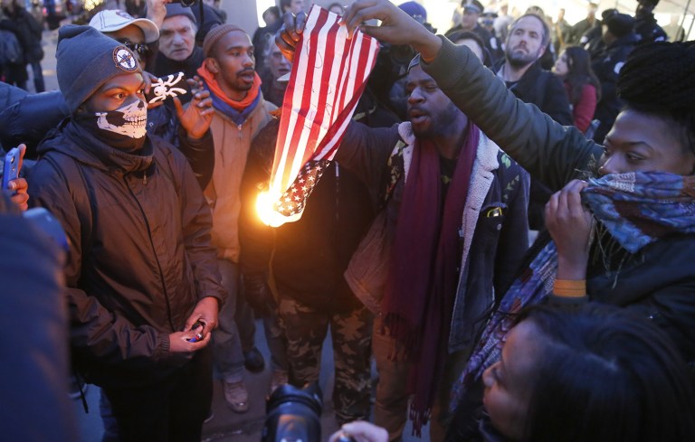 Flag burning has always been a controversial and emotional issue in United States politics. (AP Photo/Charles Rex Arbogast, File)