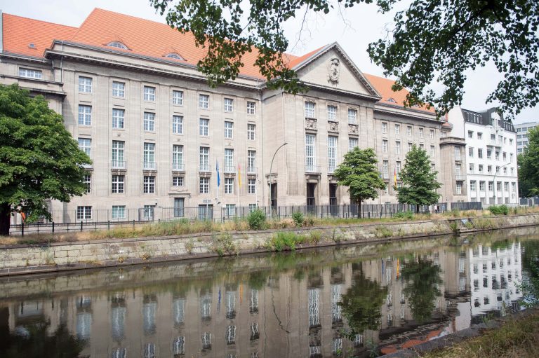 The German defense ministry is pictured through a fence in Berlin, Germany, Wednesday, July 9, 2014. German authorities are investigating a second spy case reportedly involving the U.S., a week after the arrest of a German intelligence employee cast a new shadow over relations between the two countries. The daily Sueddeutsche Zeitung reported, without naming sources, that the man being investigated worked at Germany's Defense Ministry and is suspected of spying for the United States. Defense Ministry spokesman Lt. Col. Uwe Roth declined to confirm the reports, but said the case fell 