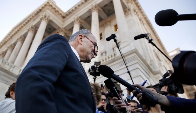 Senate Minority Leader Chuck Schumer, D-N.Y., center, speaks to the media outside the Capitol after meeting with President Trump. 