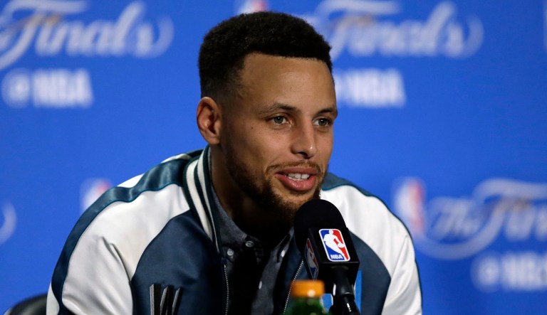 The National Association for the Advancement of Colored People, or NAACP, is going on a full-court press against President Trump after he rescinded Golden State Warriors guard Stephen Curry's invitation to visit the White House. (AP Photo/Ben Margot)