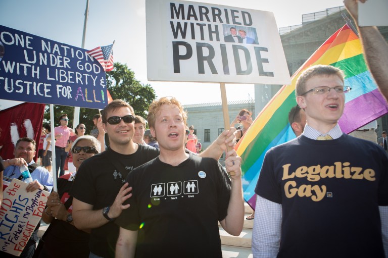 Gay marriage supporters outside the Supreme Court, Wednesday, June 26. Americans are split over the Supreme Court's recent rulings on a handful of controversial issues, according to a new poll. (Photo: Graeme Jennings)