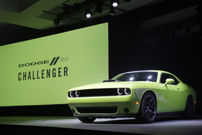The 2015 Dodge Challenger is introduced at the New York International Auto Show in New York, Thursday, April 17, 2014.  (AP Photo/Seth Wenig)