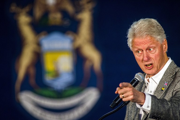 Former President Bill Clinton has spent the last three days criticizing the Affordable Care Act, clarifying his comments and causing a headache for Hillary Clinton's campaign. (Jake May/The Flint Journal via AP)