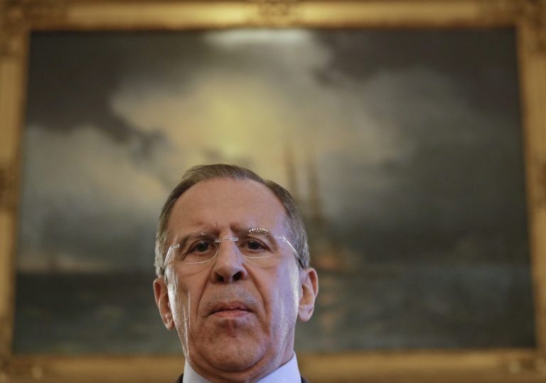 Russian Foreign Minister Sergey Lavrov speaks at a press conference at the Russian Ambassador's residence in London, Friday, March 14, 2014. Russian Foreign Minister Sergey Lavrov spoke following a meeting with US Secretary of State John Kerry. (AP Photo/Kirsty Wigglesworth)