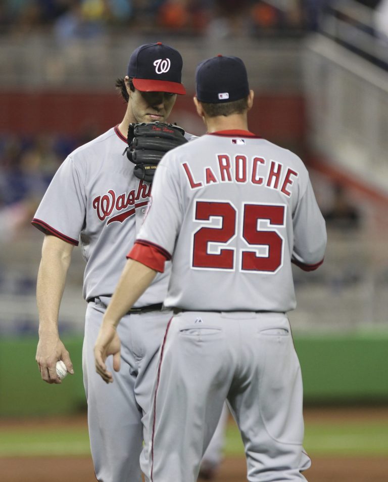 Marc Serota/Getty Images
Nationals pitcher Dan Haren couldn't make it out of the fifth inning and allowed seven runs, four unearned, in Washington's loss to Miami on Tuesday.