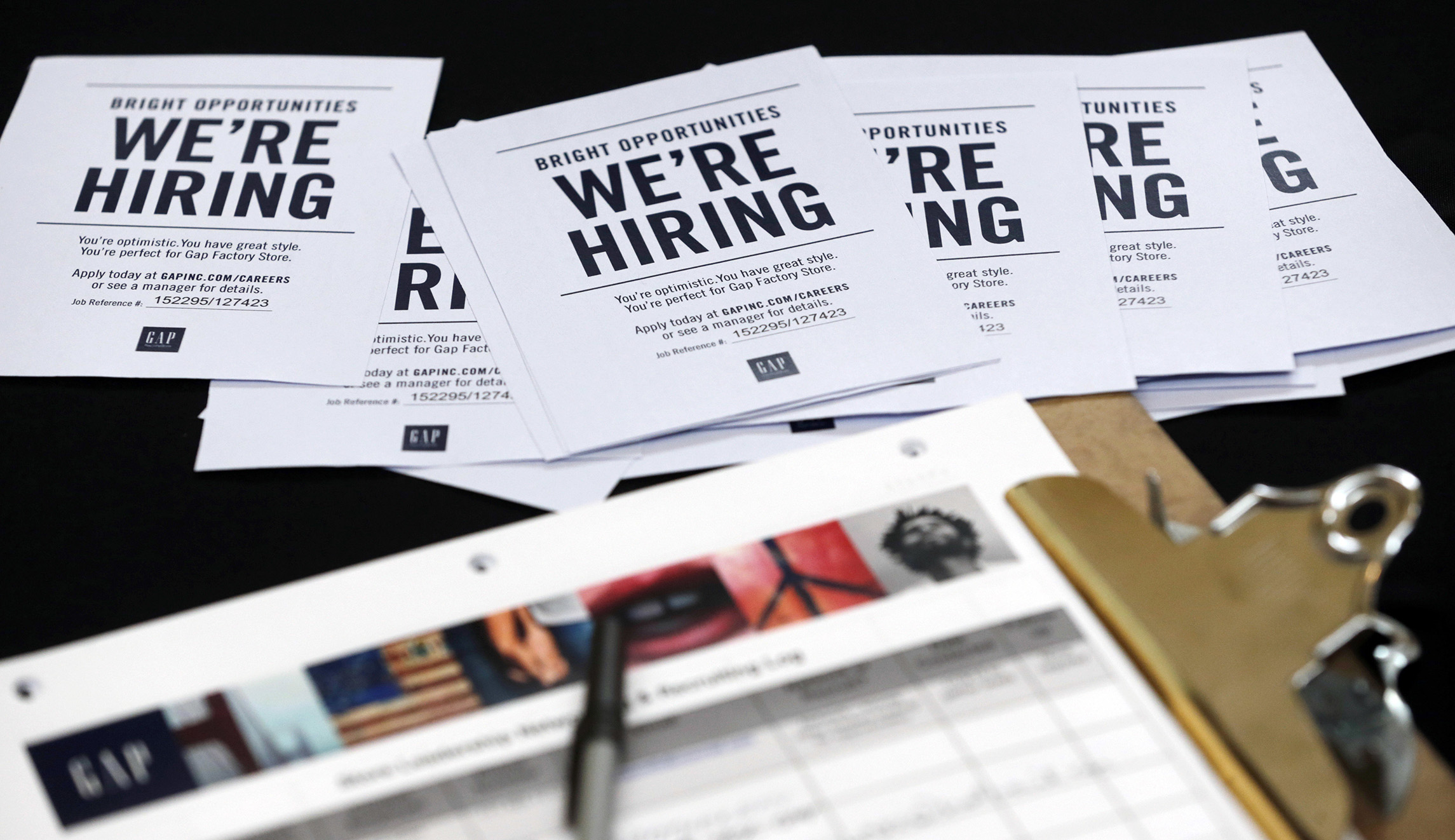 Jobless claims fall to 214,000 in sign of labor market strength