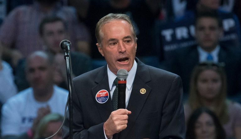 Rep. Chris Collins, R-N.Y., speaks to the crowd before the arrival of Republican presidential candidate Donald Trump during a campaign stop at the First Niagara Center, Monday, April 18, 2016, in Buffalo, N.Y.