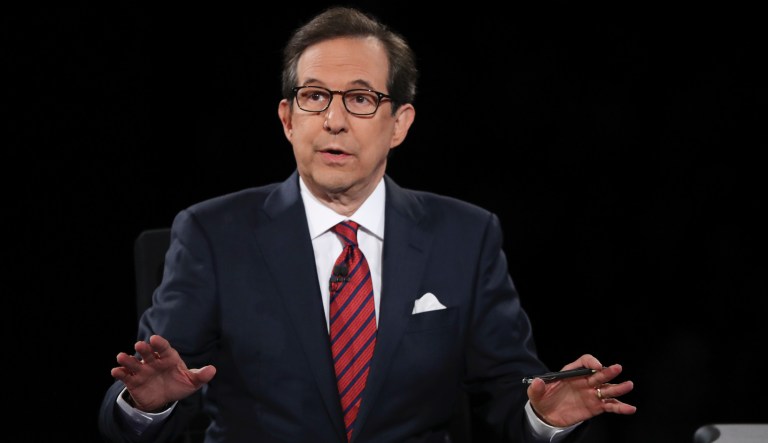 Moderator Chris Wallace of FOX News guides the discussion between Democratic presidential nominee Hillary Clinton and Republican presidential nominee Donald Trump during the third presidential debate at UNLV in Las Vegas, Wednesday, Oct. 19, 2016.