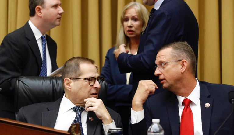 House Judiciary Committee Chairman Jerrold Nadler, D-N.Y., bottom left, speaks with Rep. Doug Collins, R-Ga., the committee's ranking member, before a markup hearing on a series of bills, including some to reduce gun violence, Tuesday, Sept. 10, 2019, in Washington.
