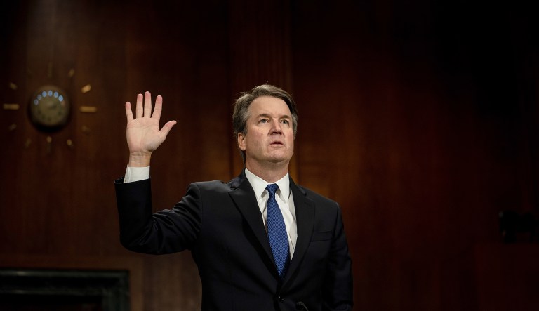 Brett Kavanaugh, U.S. Supreme Court associate justice nominee for U.S. President Donald Trump, is sworn in to a Senate Judiciary Committee hearing in Washington, D.C., U.S., on Thursday, Sept. 27, 2018. Christine Blasey Ford said she is "one hundred percent" certain that KavanaughÂ is the person who sexually assaulted her when they were teenagers, and she told a Senate committee that he and his friend laughed at her expense during the attack.