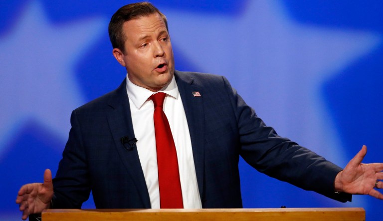 Republican Corey Stewart gestures during a debate with U.S. Sen. Tim Kaine in Richmond, Va., Tuesday, Oct. 2, 2018.