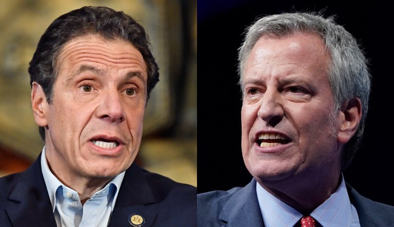 Pictured are Andrew Cuomo, left, and Bill de Blasio, right.