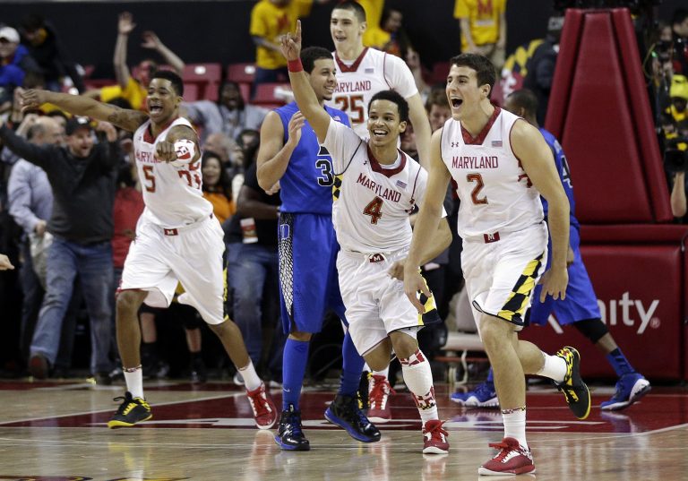 Patrick Semansky/AP
Maryland guard Seth Allen, center, had plenty of reason to celebrate after his two free throws with 2.8 seconds remaining provided the margin of victory in the Terps' 83-81 win over Duke on Saturday.