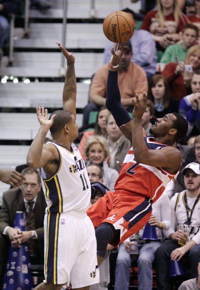 Rick Bowmer/AP
John Wall finished with 14 points and eight assists in the Wizards' loss to the Jazz on Wednesday.