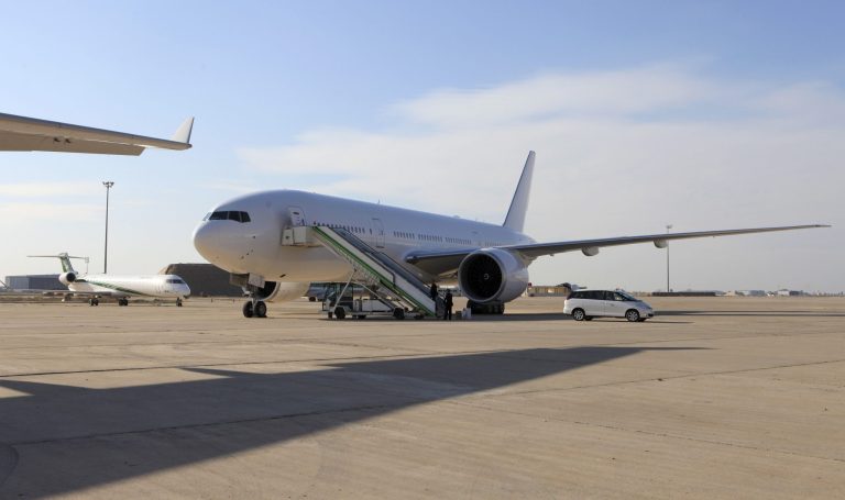   A Boeing 777 plane is seen after landing in Baghdad, Iraq, Saturday, Dec. 15, 2012. The first new Boeing jetliner sold to Iraq in years touched down in Baghdad on Saturday, signaling the country's determination to rebuild its economy after decades of war and sanctions. (AP Photo/Karim Kadim)  