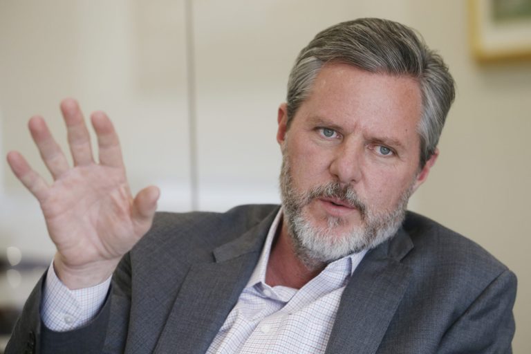 Liberty University president Jerry Falwell Jr., gestures during an interview in his offices at the school in Lynchburg, Va.