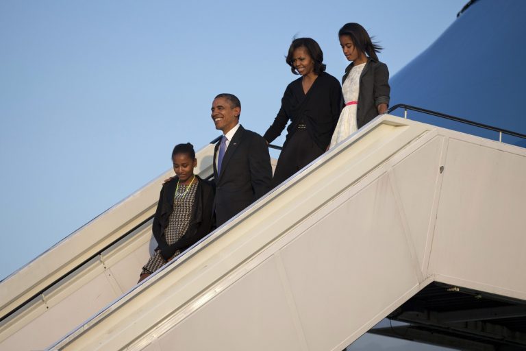 President Barack Obama and family, from left, daughter Sasha, first lady Michelle Obama, and daughter Malia, on Wednesday will embark on his first extended trip to Africa. (AP Photo/Evan Vucci, file)